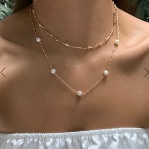 New EN ROUTE LYDIA CROSS CHOKER
18k gold